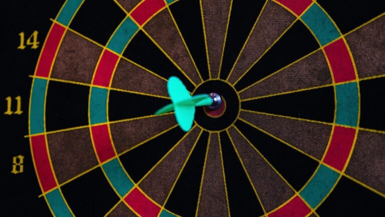 a dart board with darts