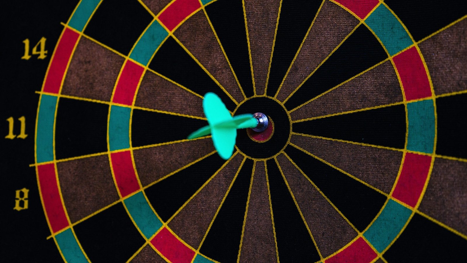 a dart board with darts
